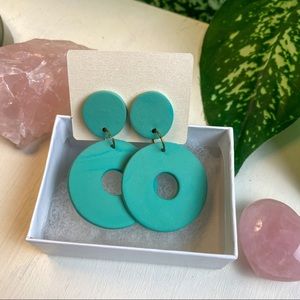 Turquoise-colored clay earrings